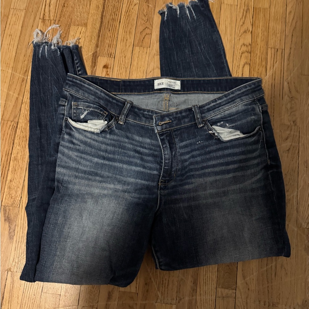 Buckle Blue Skinny Jeans with Distressed Vintage Look